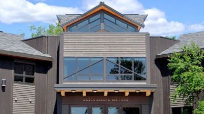 Front entrance of Anishinabek Nation building with AEI logo